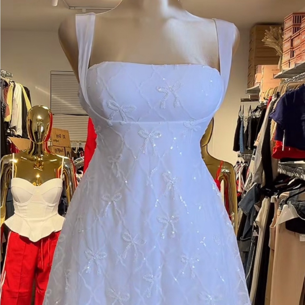 Elegant White Dress with Bow Details